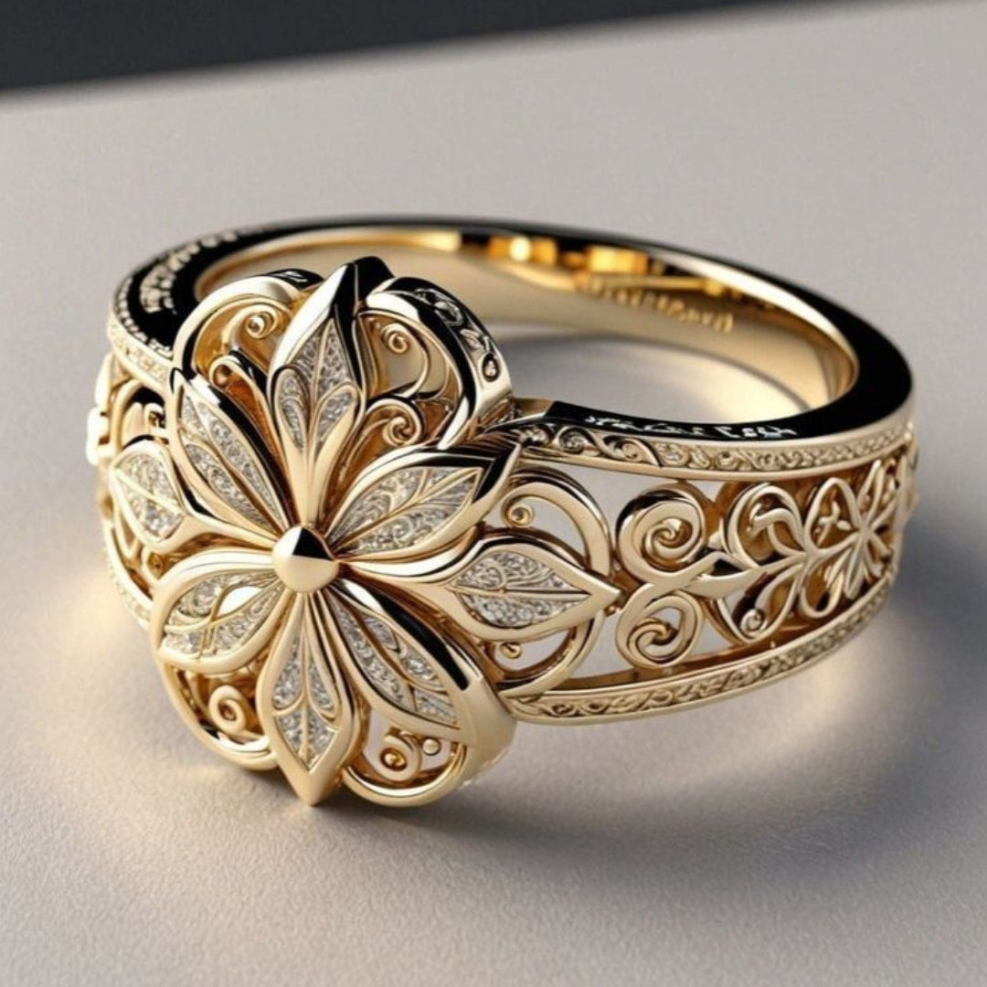 Eksotisk guldring med blomst og zirkonia