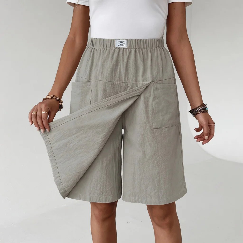 Clara elastiske active-shorts med lommer