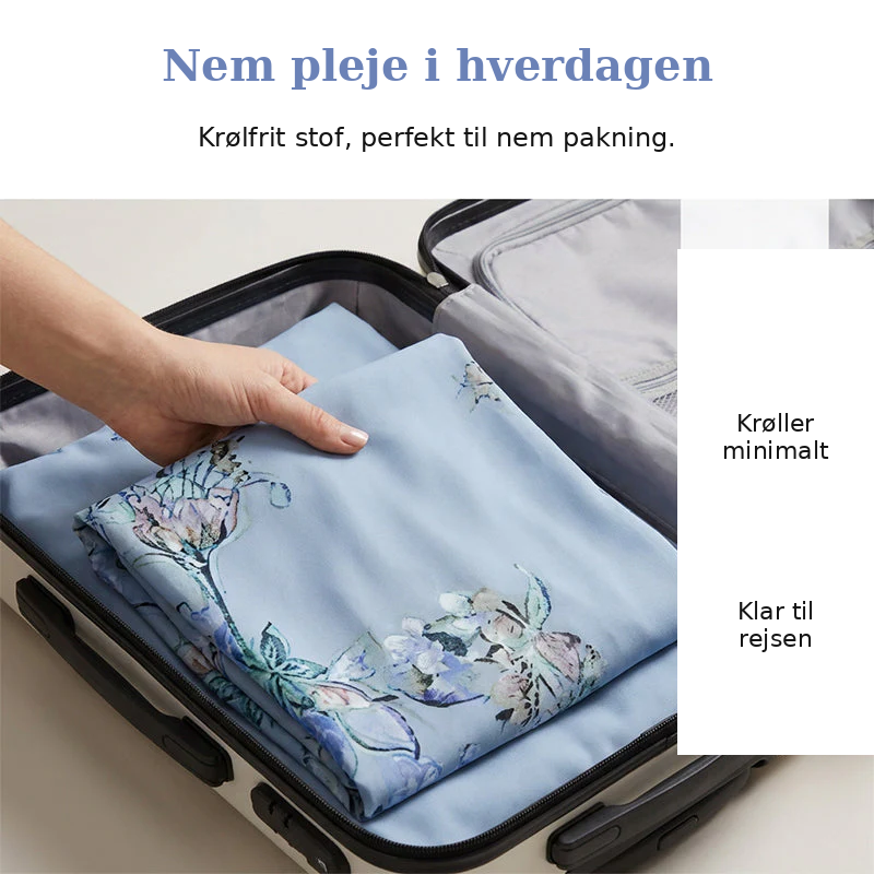 Freja | Luftige bukser med blomsterprint og vide ben