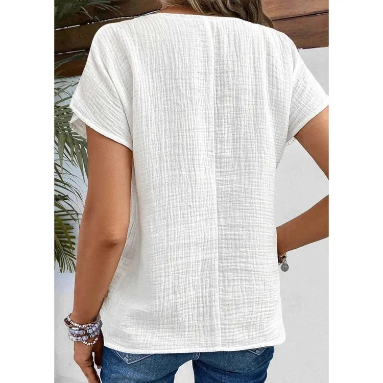 Elise elegant bomuld-linned skjorte med knappedetaljer