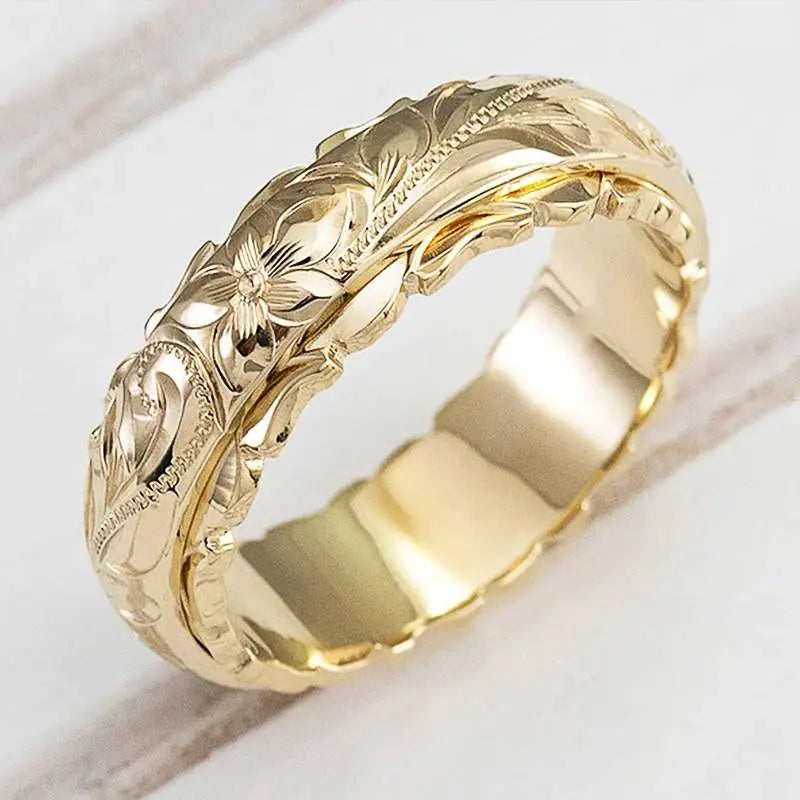 Vintage guldring med blomst
