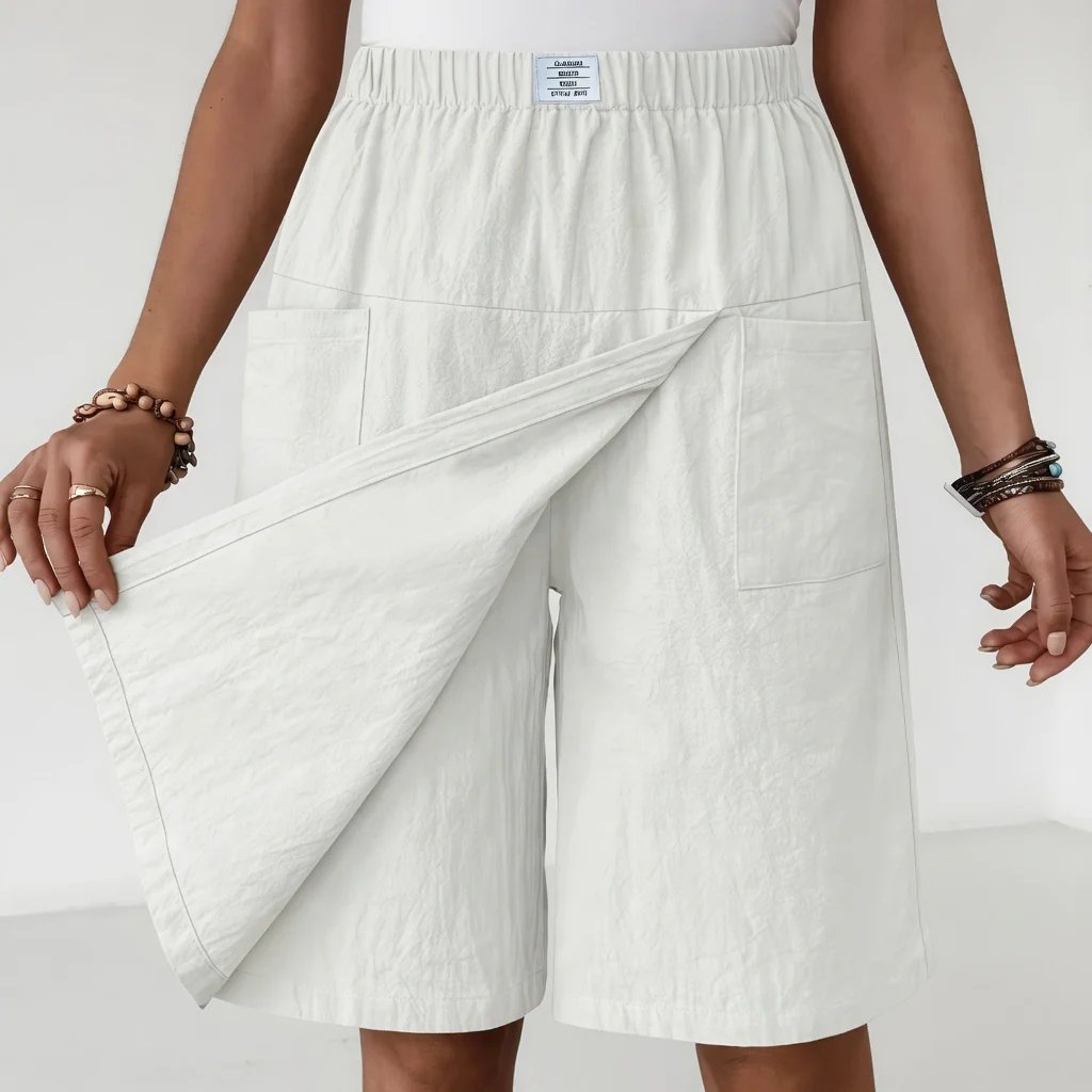 Clara elastiske active-shorts med lommer